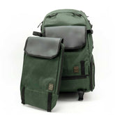 Green backpack with a smaller green pouch on a white background
