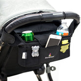 Stroller organizer with drink holders, phone case, and other items on a stroller.