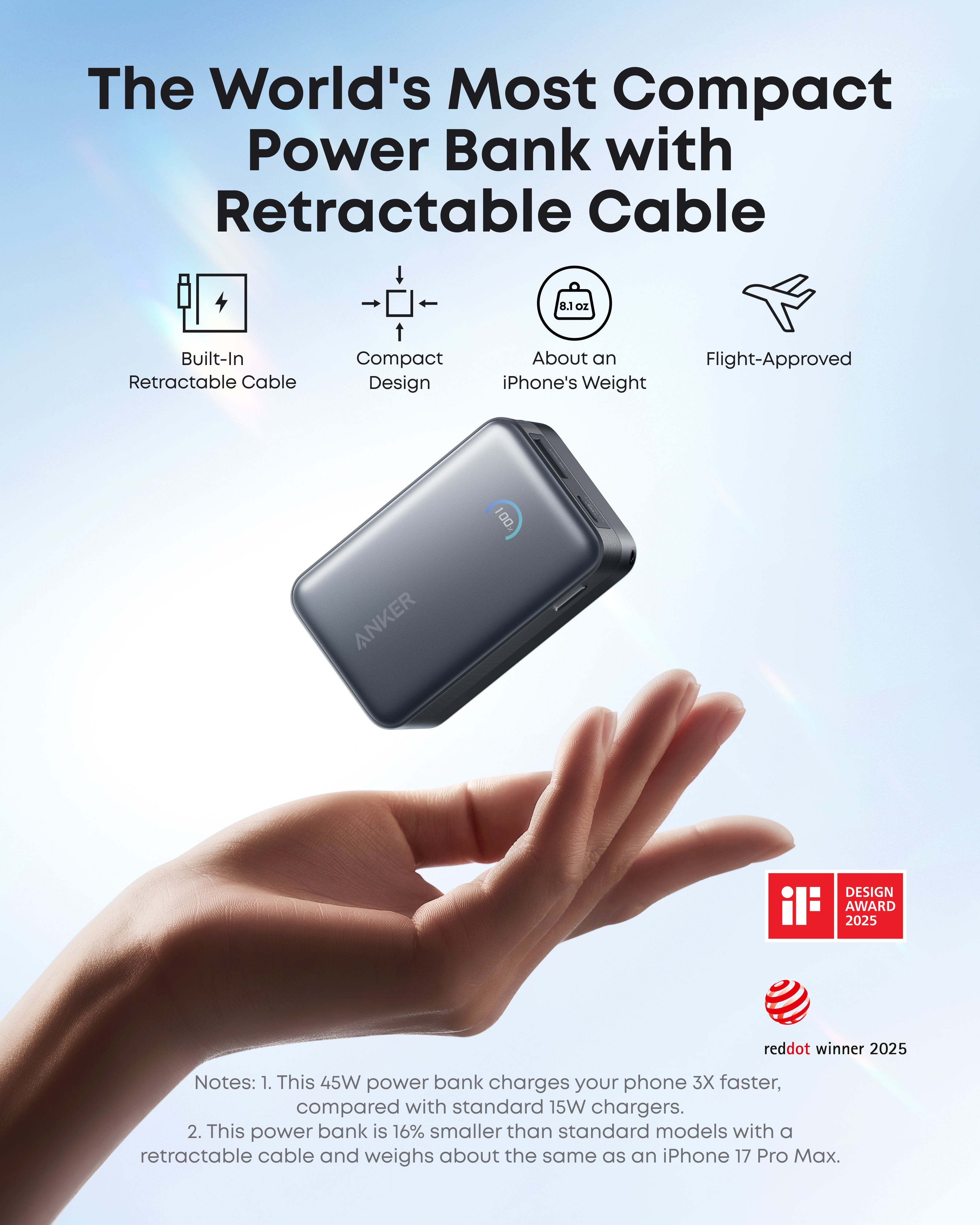 Power bank with retractable cable held in hand against a light blue background