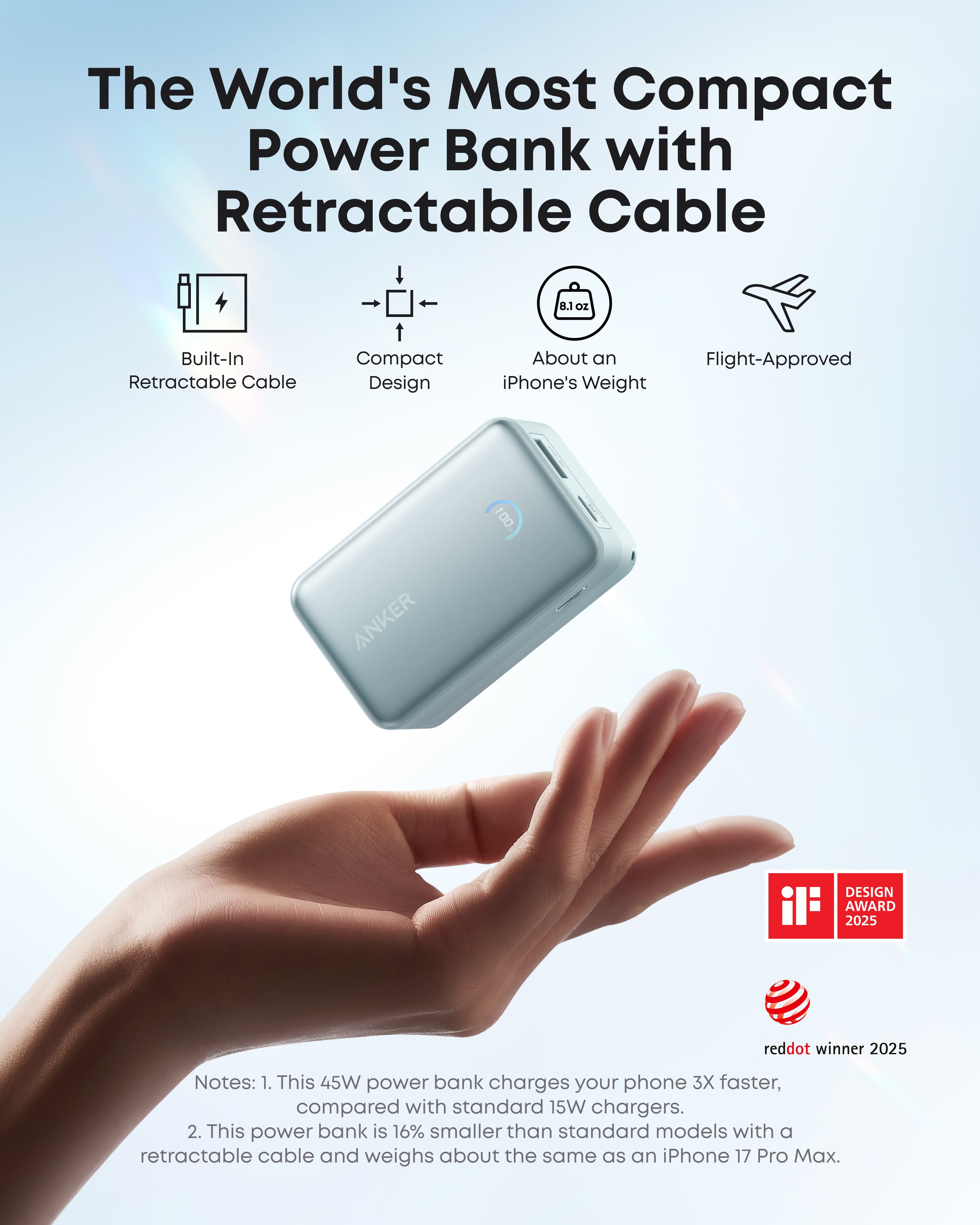 Power bank with retractable cable held in hand against a light blue background