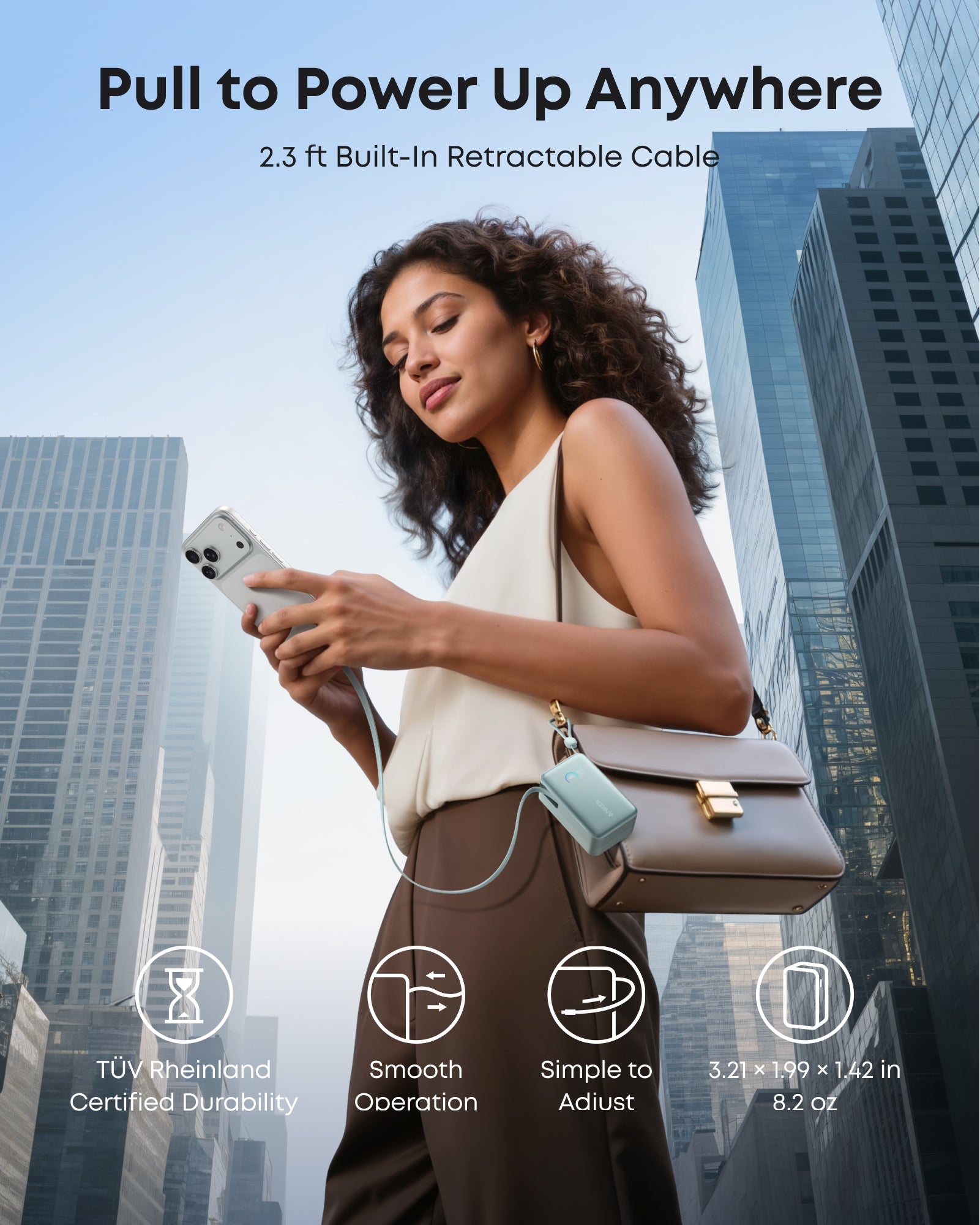 Woman using a phone with a retractable cable in an urban setting