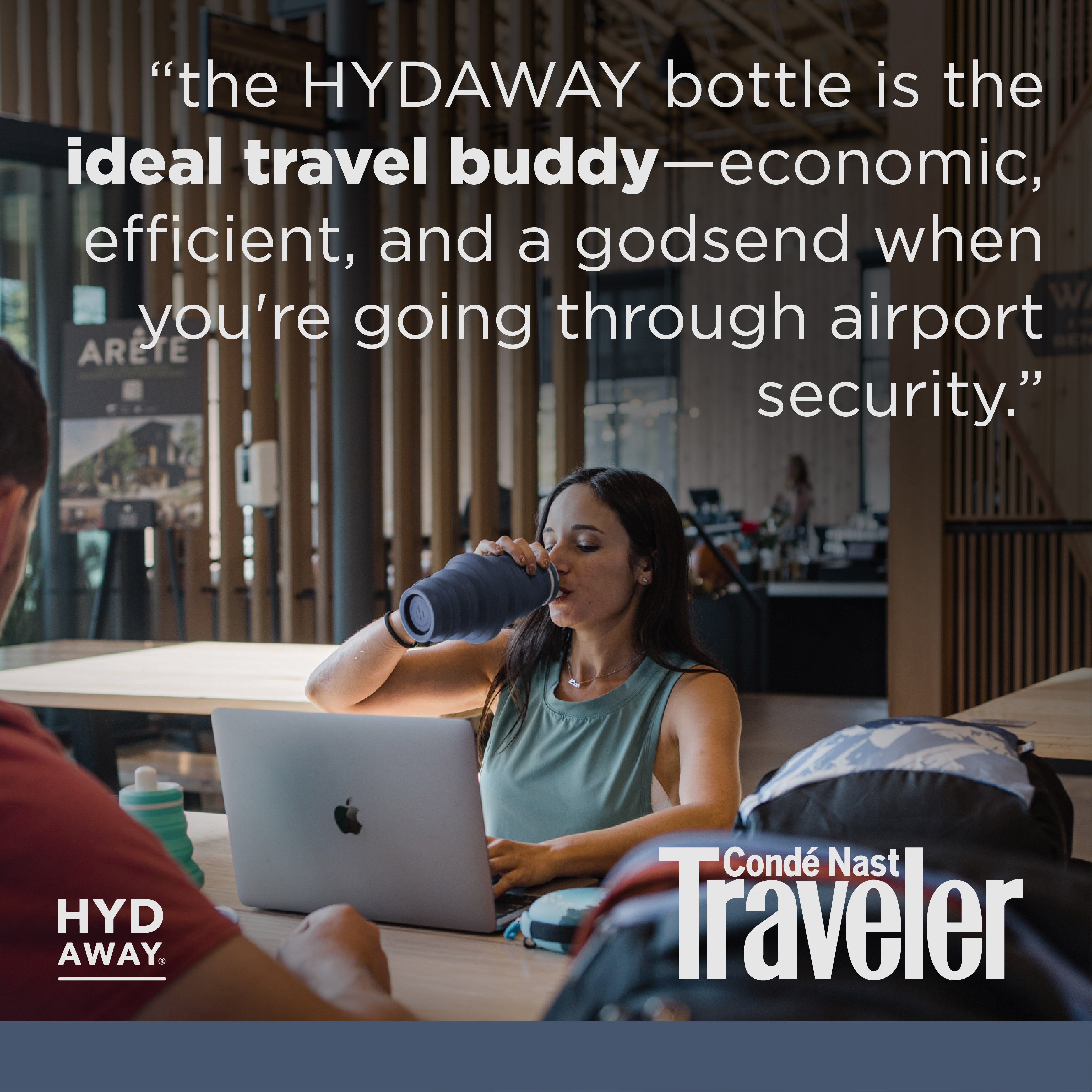 Person using a laptop with a bottle, text about HYDAWAY bottle, and Conde Nast Traveler logo.