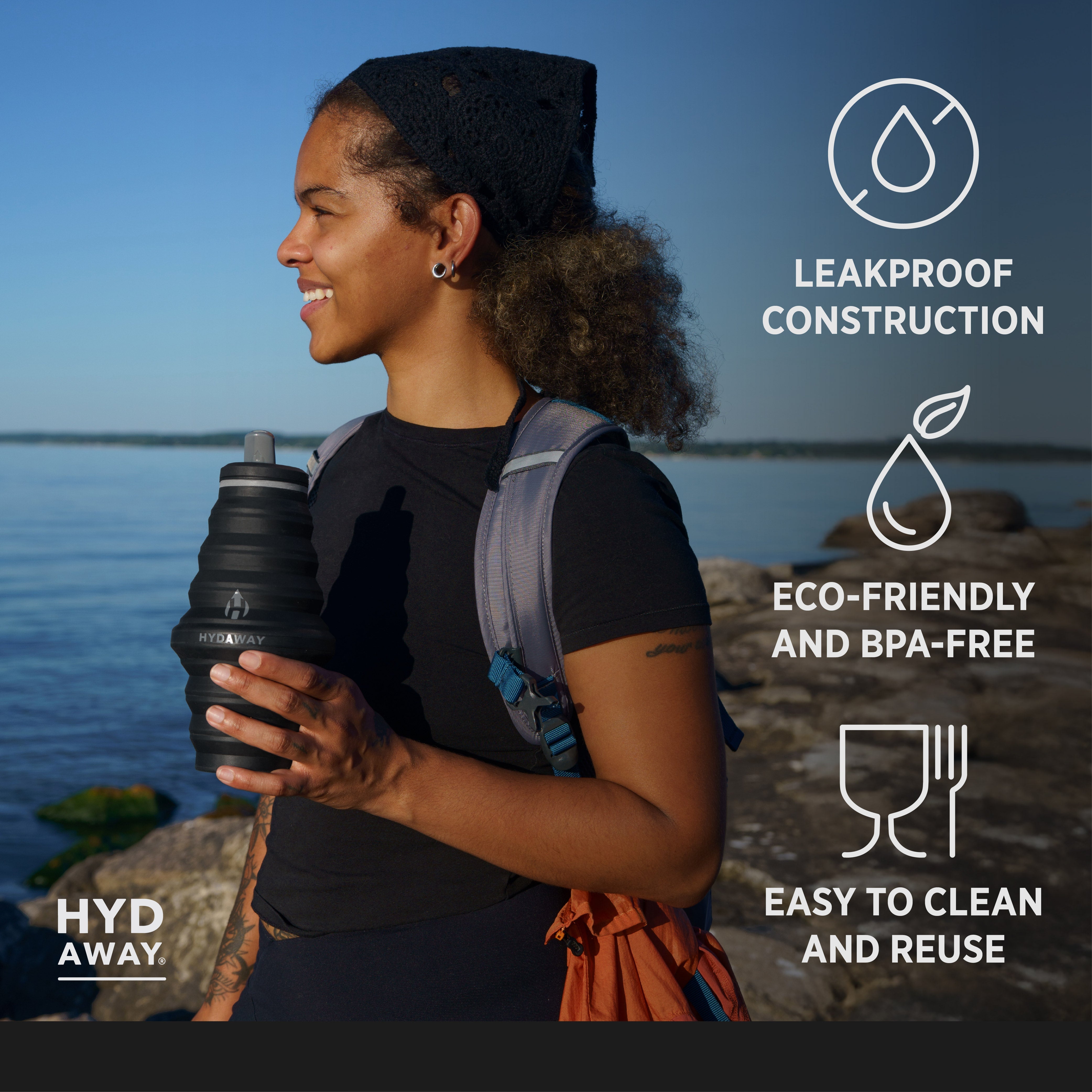 Person holding a black water bottle with features listed on the right, against a scenic background.