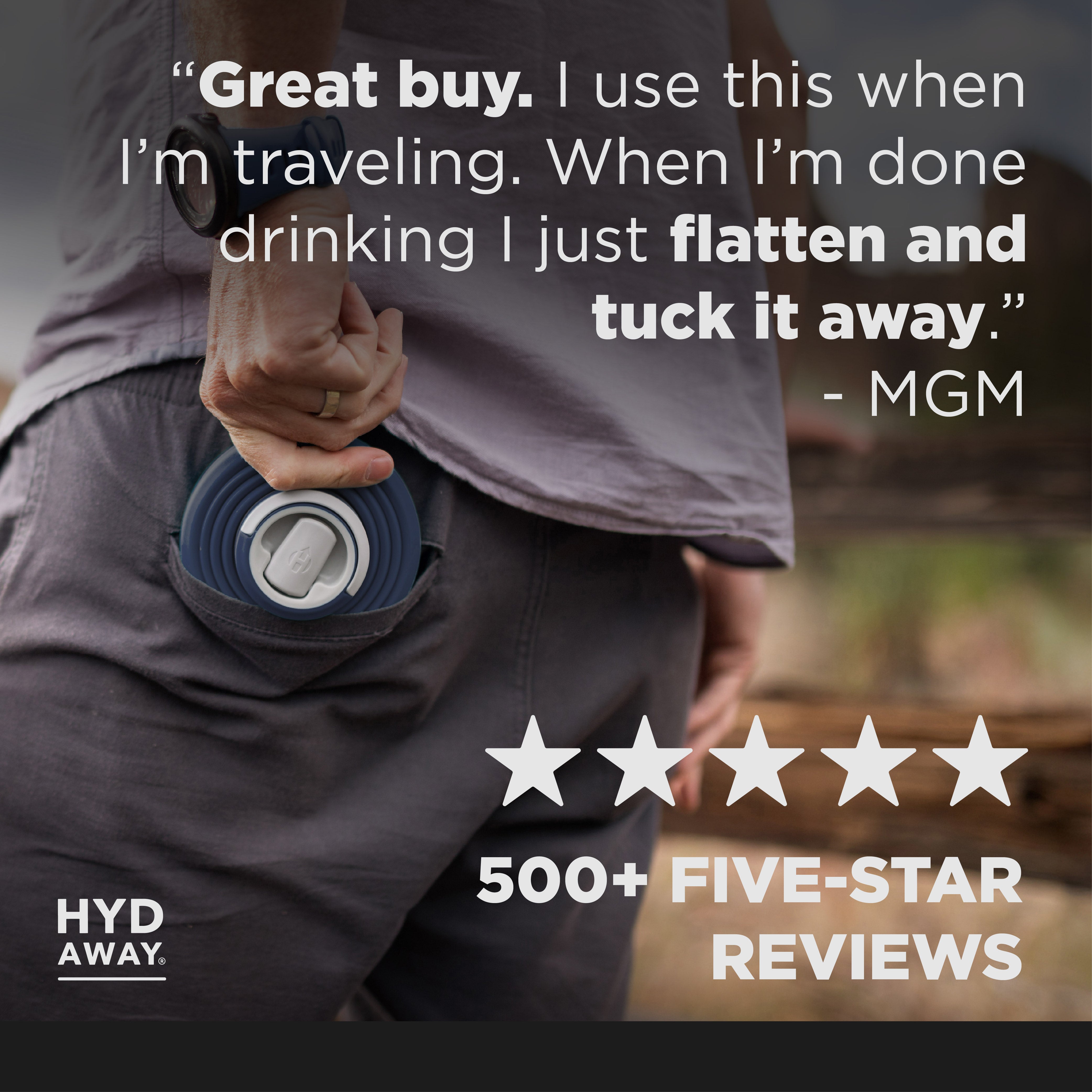 Person holding a blue travel mat with text and rating on a blurred background