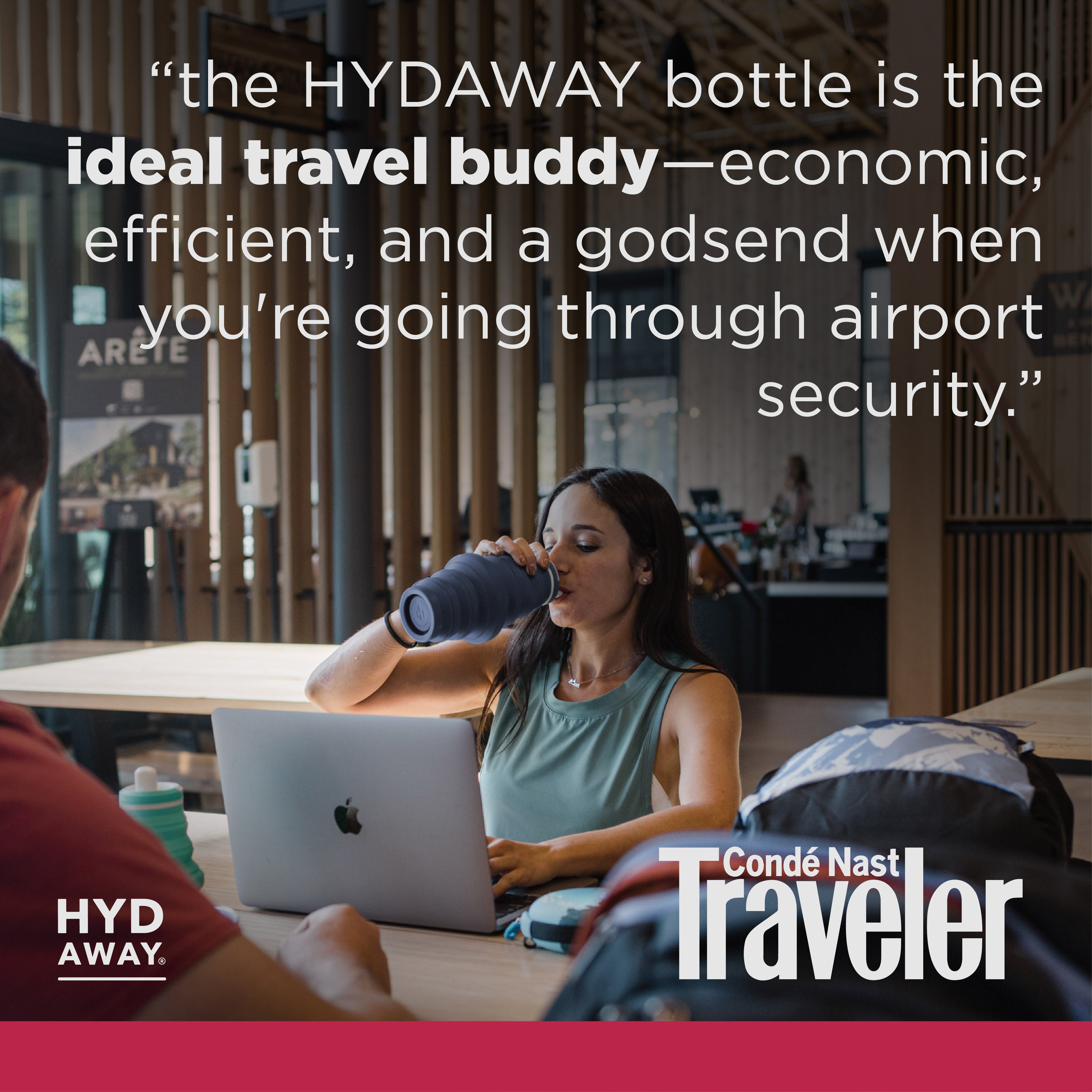 Woman drinking from a bottle while using a laptop with Hyd Away branding and Conde Nast Traveler logo.