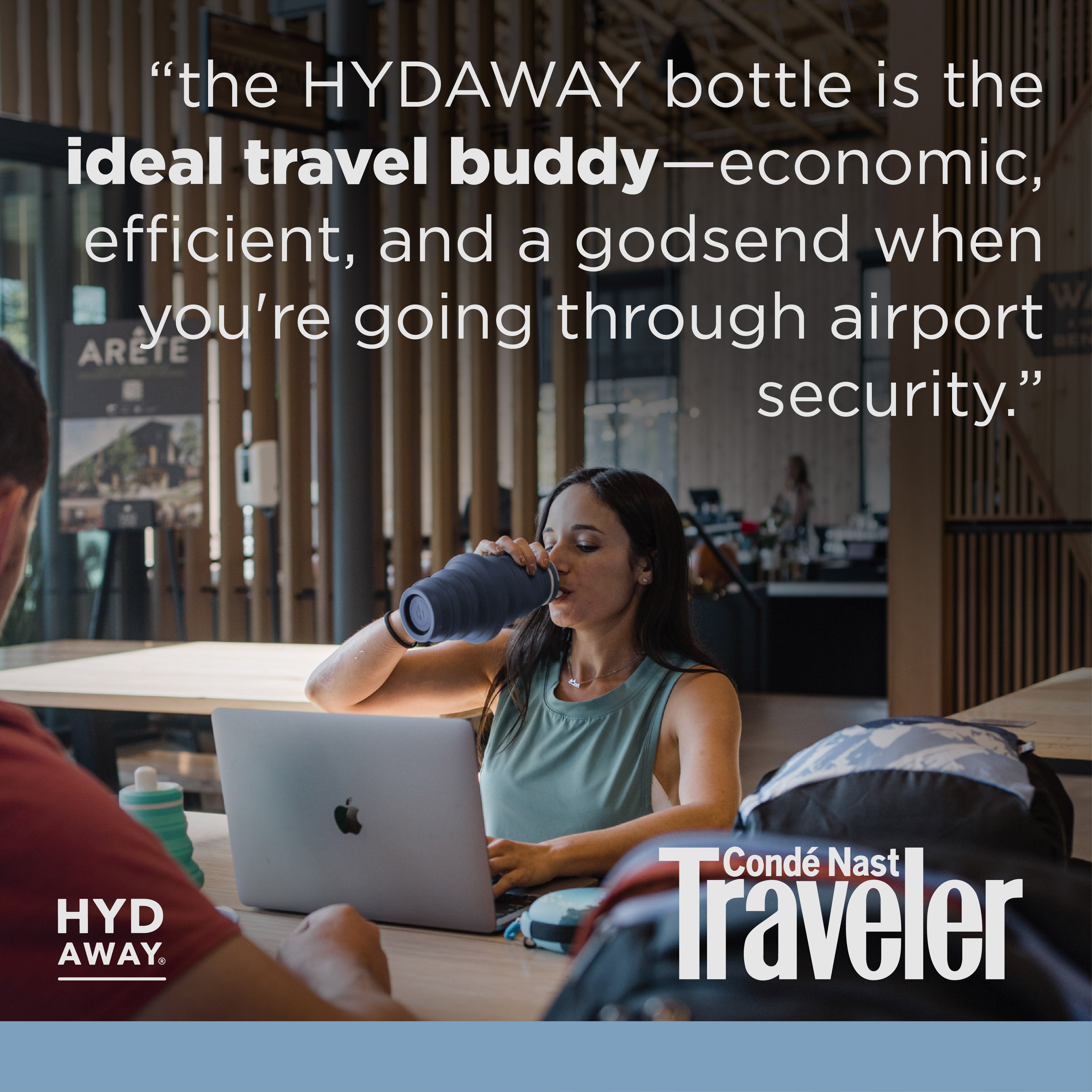 Person using a laptop with a bottle, text about HYDAWAY bottle, and Conde Nast Traveler logo.