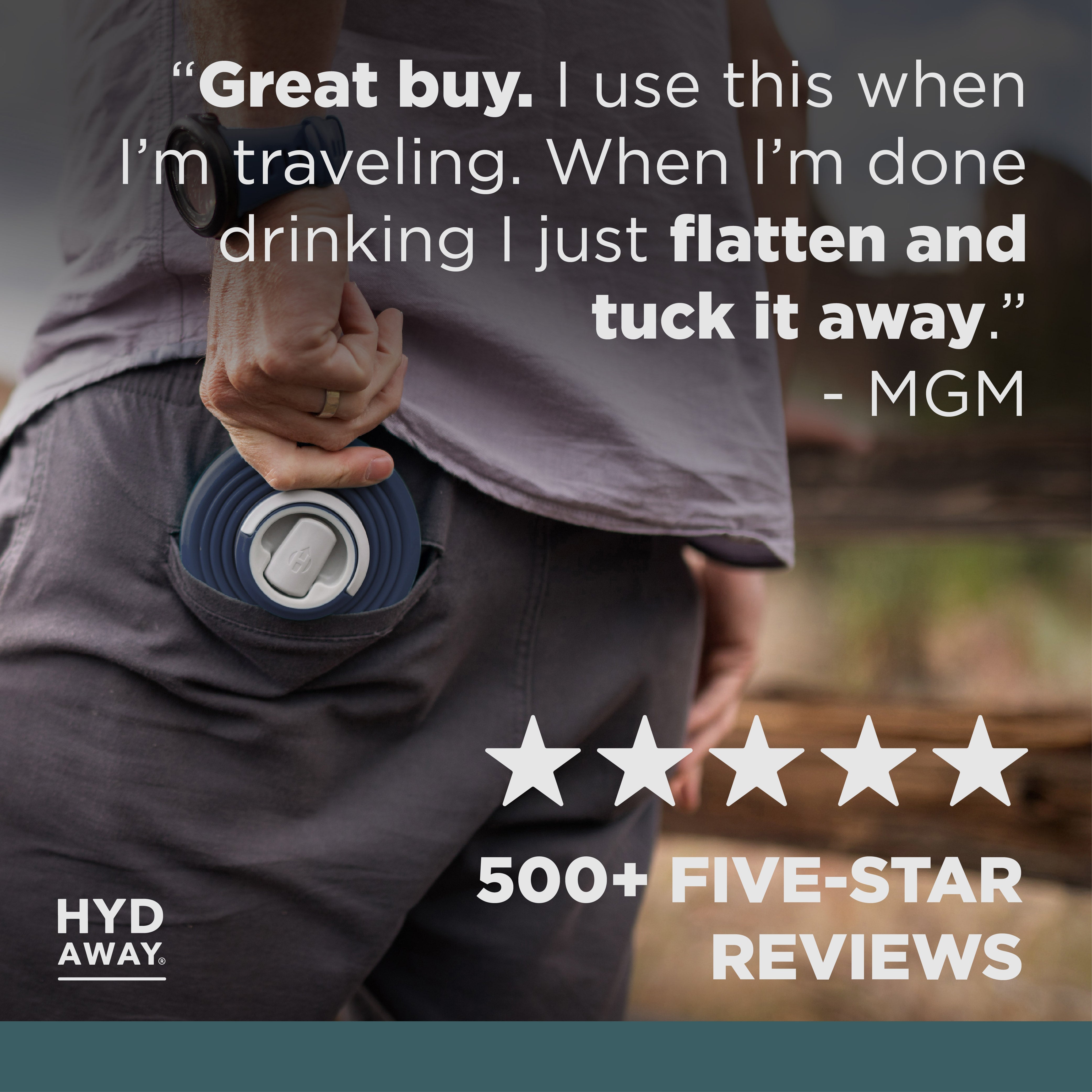 Person holding a blue travel mat with text and rating on a blurred background