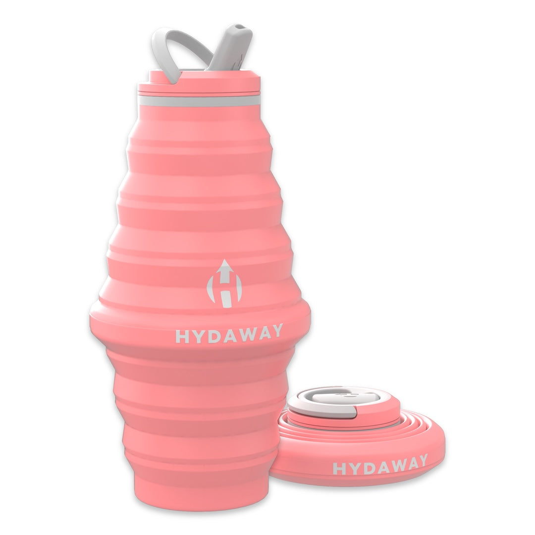 Collapsible pink water bottle with 'HYDAWAY' branding on a white background