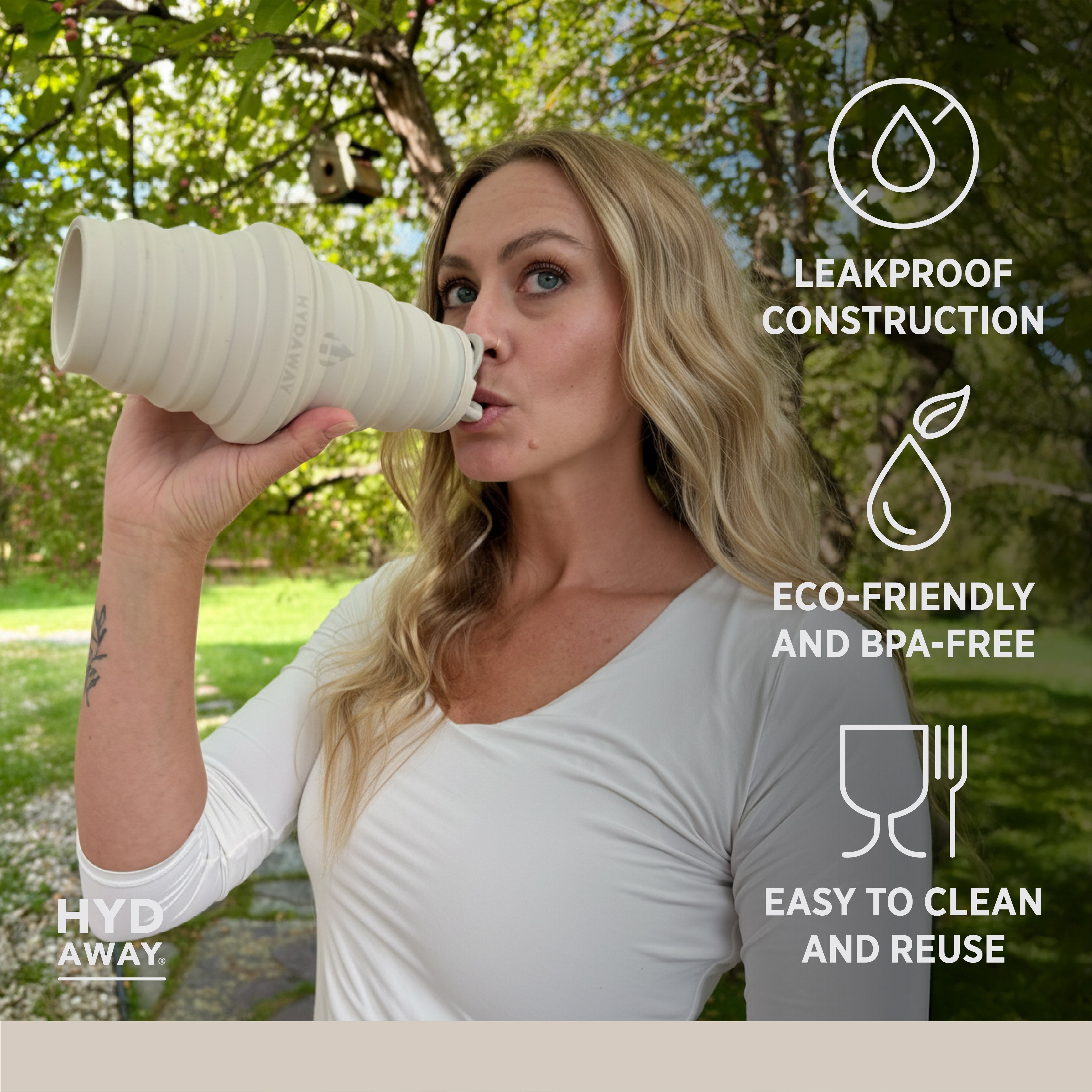 Woman drinking from a white silicone cup outdoors with product features displayed.