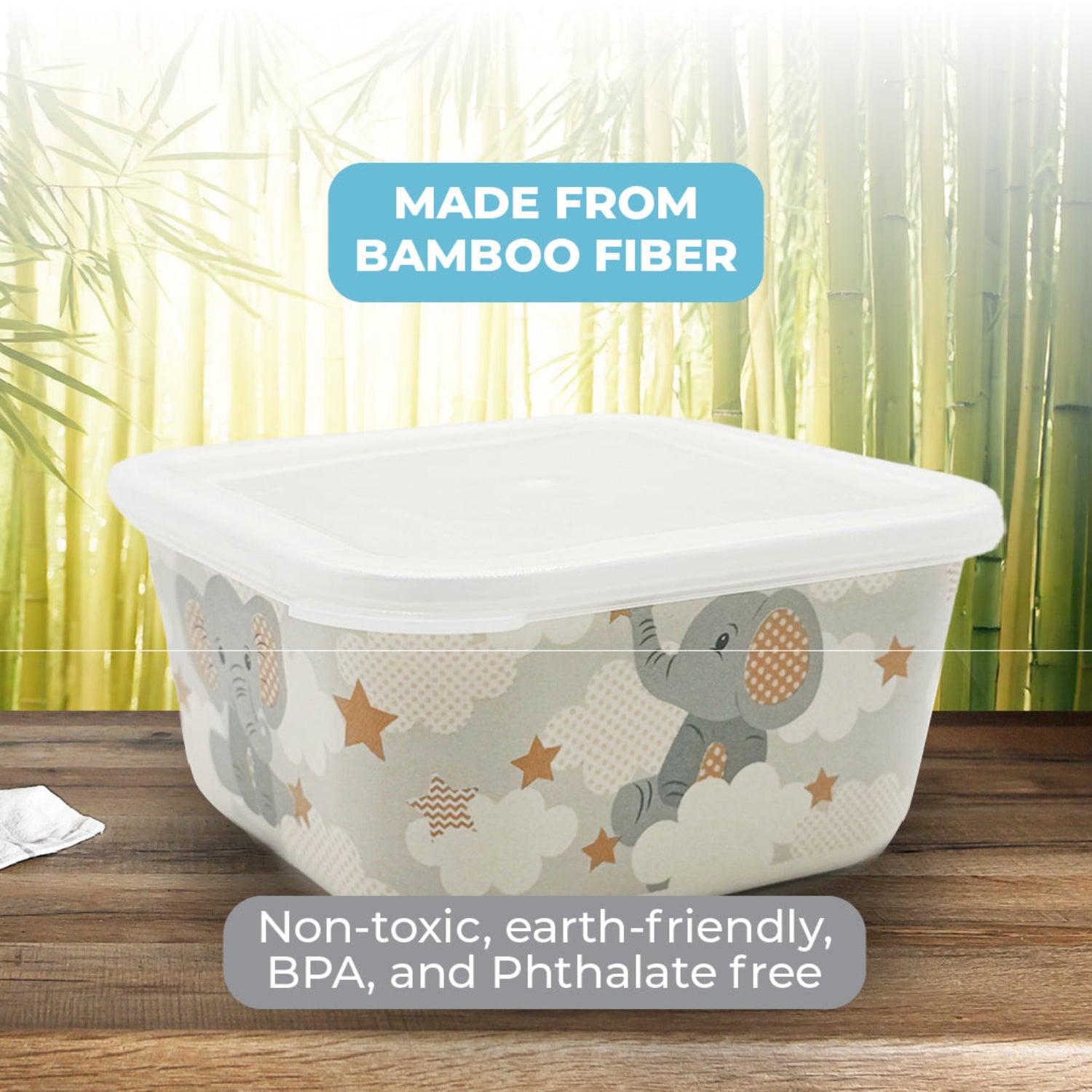 Baby bathtub with elephant design on a wooden surface, bamboo background