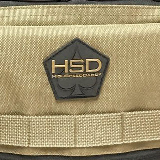 Tan fabric with a black and gold logo and text on a product