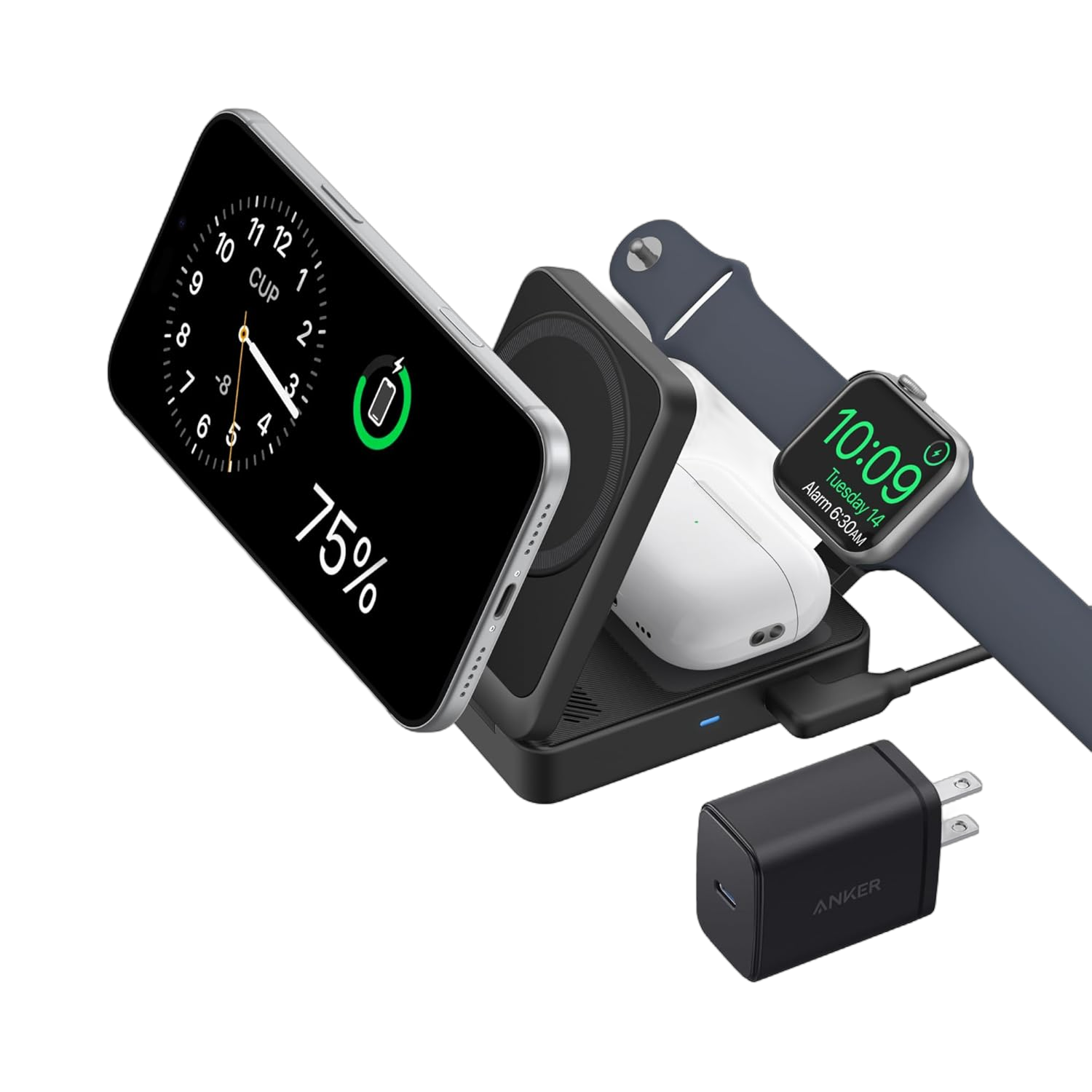 A black Anker wireless charging dock shown with multiple devices plugged in, including a smartphone, an Apple Watch, and a white earbud case, on a clean white background.
